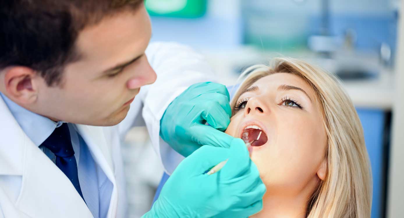 Doctor With Patient in Dental