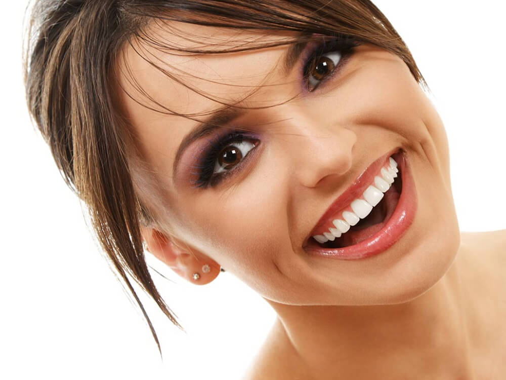 beautiful smile with advanced restorative dental care treatments at Stoneycreek Village Dental
